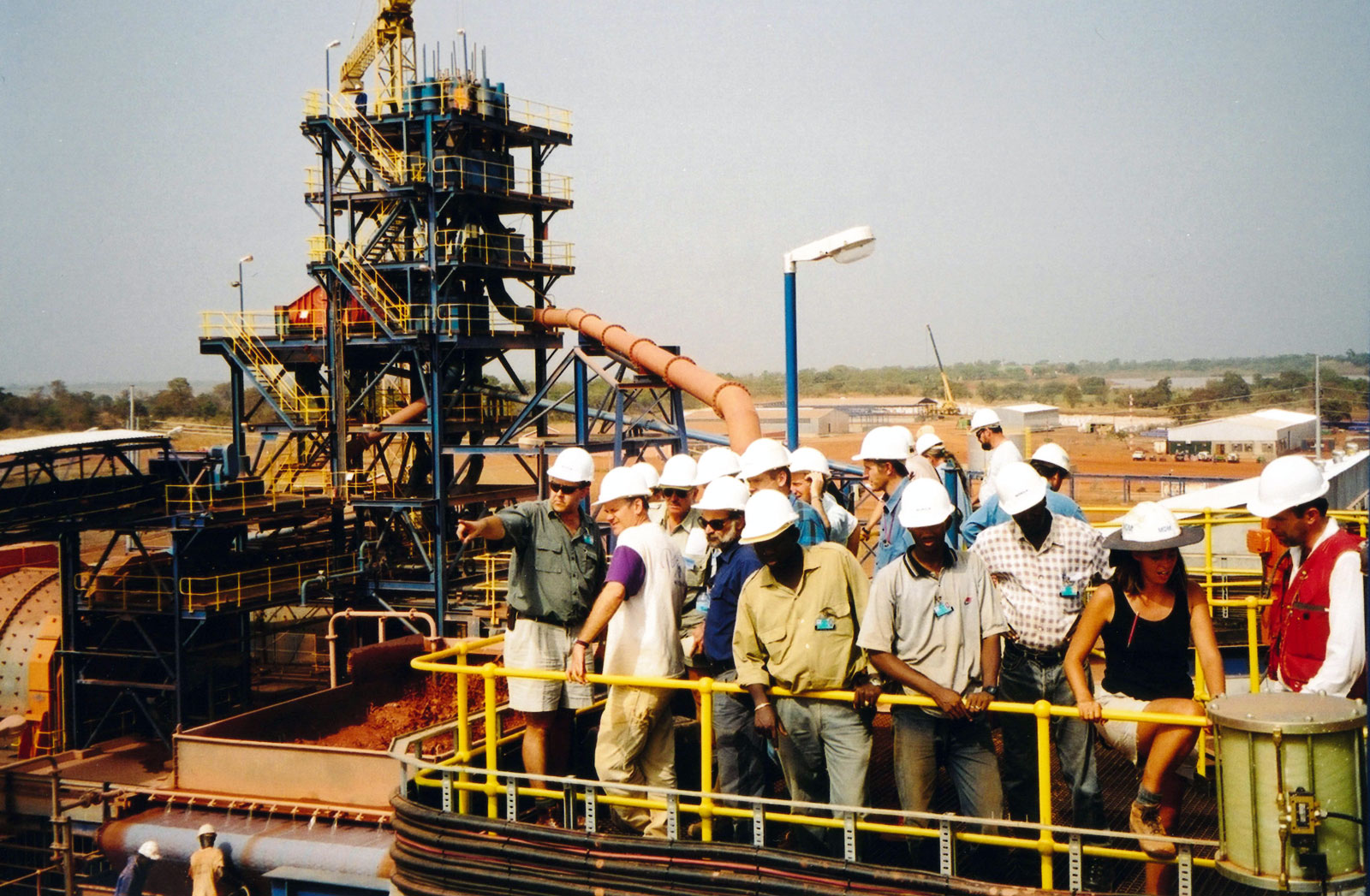 [Peet van Schalkwyk explains the process on the treatment plant at Morila, Mali.]